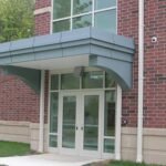 How Do Metal Composite Material Wall Panels Compare to Traditional Cladding Materials?